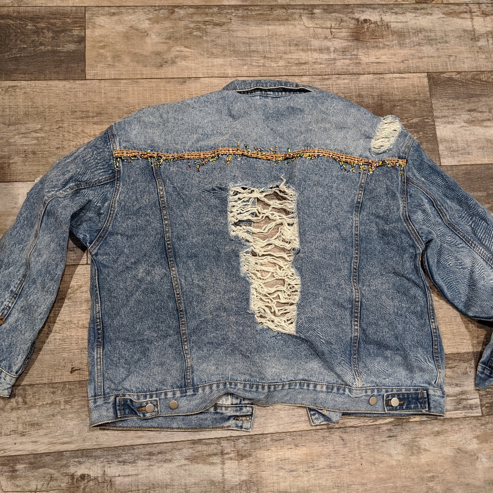 Distressed jean jacket
